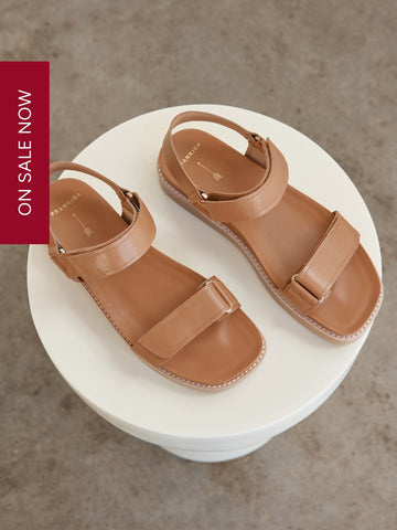 <p><em>Slides & Sandals</em></p>